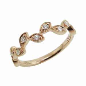 18K Rose gold diamond band with leaf design and milgrain edge pave set with nine round brilliant cut diamonds totaling 0.17 carats, G/H, SI1.