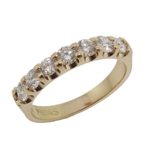 14K Yellow gold diamond band set with seven very good-excellent cut, round brilliant cut diamonds, totaling 0.72 carats, H-I, VS-SI. Special Sale price $1895 while they last - only 2 available!