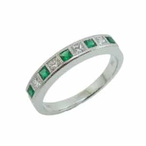 18K White gold channel set alternating princess cut emerald and diamond band, with five emeralds, total 0.27 carats, and 4 diamonds, total 0.21 carats, G/H, SI1.