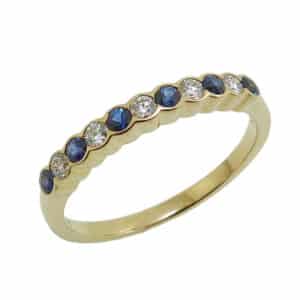 18K Yellow gold bezel set sapphire, 0.24 total carat weight, and diamond, 0.13 total carat weight, G/H, SI1, lady's band.