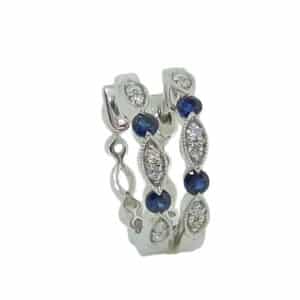 14K White gold sapphire and diamond hoop earrings set with alternating sapphires, total 0.13 carats, and diamonds, total 0.07 carats, G/H, SI1.