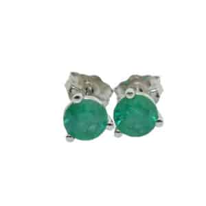 14K White gold studs earrings set with 2 round emeralds, totaling 0.58 carat.