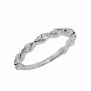 14K White gold band shared claw set with nine marquise shaped lab grown diamonds totaling 0.72 carats, VS, E/F.