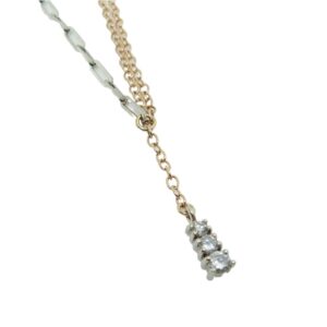 14K White/yellow gold paperclip and elongated cable necklace, set with 3 round brilliant cut diamonds totaling 0.255 carats SI1-2