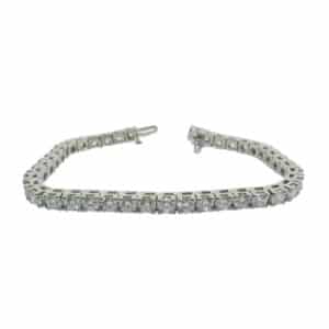 14K White gold tennis bracelet claw set with 40 round brilliant cut lab grown diamonds totaling 10 carats, G/H, SI1-VS2.