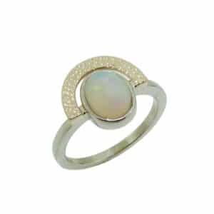14K White gold ring bezel set with one 1.33 carat oval Brazilian jelly opal accented with 14 Karat reticulated yellow gold.