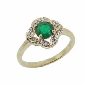 14K Yellow gold vintage style halo lady's ring set with a 0.618 carat round emerald and accented in the halo with round brilliant cut diamonds, 0.08 total carat weight, G/H, SI.