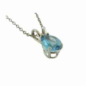 14K White gold pendant set with a 1.54carat pear shaped blue topaz.