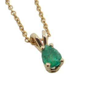 14KYellow gold pendant set with one 0.256 carat pear shaped emerald.