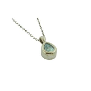 14K white gold pendant bezel set with 1.10 carat blue zircon.