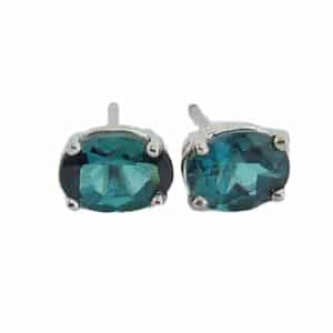 14K White gold oval blue tourmaline stud earrings, 1.58 total carat weight.