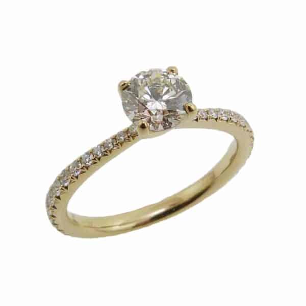 Available in 18K yellow or rose gold or platinum. This ring can be made in any combination of metals and can be customized to accommodate different size Hearts On Fire diamond centres.