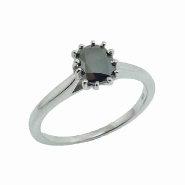 14K White gold solitaire engagement ring set with a 0.758 carat oval black diamond.
