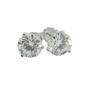 14K White gold 3 prong studs with butterfly backs set with 1.54 carat D, VS1 and 1.55 carat D, VS1 lab grown diamonds.