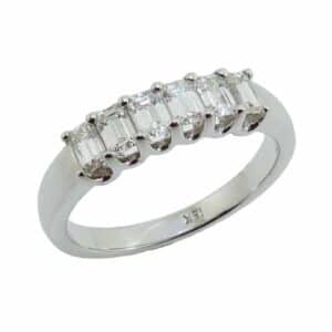 18K White gold lady's band claw set with six emerald cut diamonds totaling 0.66 carat, F-G, VS1-2.