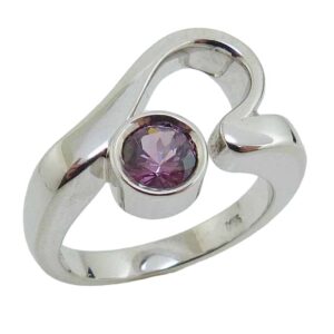 14K White gold custom lady's ring set with a 0.604 carat purple spinel.