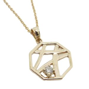 14K Yellow gold fancy pendant claw set with a round brilliant cut diamond, 0.092 carat, J, SI1.