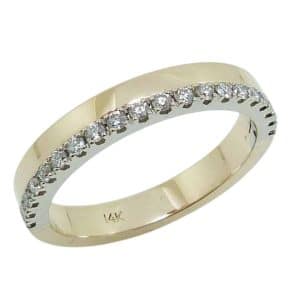 14K Yellow gold lady's wedding band claw set on one side with twenty round brilliant cut natural diamonds totaling 0.26 carats, G-H, SI.