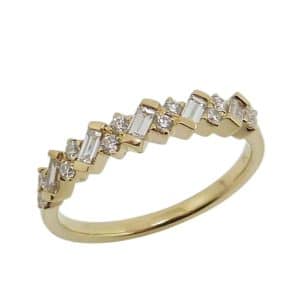 18K Yellow gold diamond band claw set with baguettes and round brilliant cut diamonds, 0.34 total carat weight, G/H, SI.