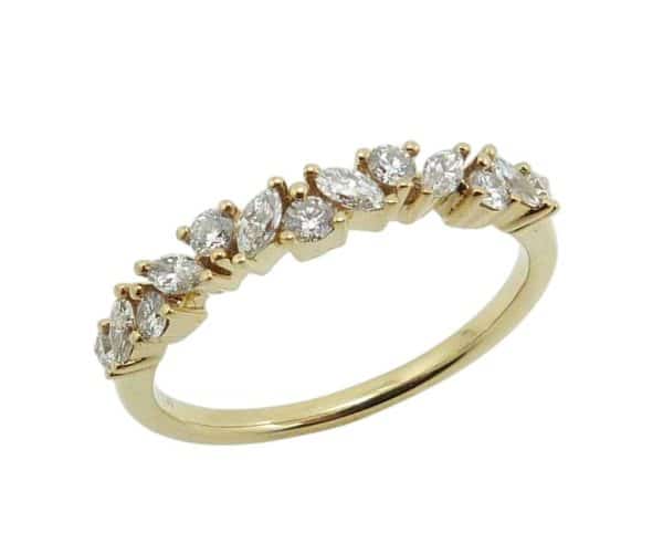 18K Yellow gold lady's band claw set with marquise and round brilliant cut diamonds, 0.40 total carat weight.