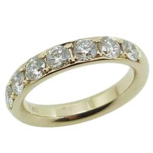 14K Yellow gold lady's band claw set with seven natural round brilliant cut diamonds, 1.025 total carat weight, G/H, SI1-2.