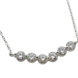 14K White gold necklace set with six lab grown round brilliant cut diamonds, 0.562 total carat weight, F/G, VS1-2.