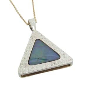 14K White and yellow gold custom pendant by Studio Tzela set with a 5 carat two sided ammolite.