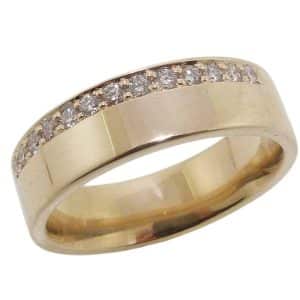 14K Yellow gold pipe style 6mm band pave set on one side with thirteen natural very good cut, round brilliant cut diamonds, 0.256 total carat weight, G/H, SI.