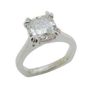 14K White gold cathedral solitaire stirrup shank engagement ring double claw set with a 2.02 carat, D, VVS2, square modified brilliant cut cushion shape lab grown diamond.