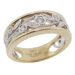 14K Yellow and white gold vine and leaf bezel set diamond lady's band, 0.25 total carat weight, G/H, SI.