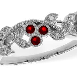 14K White gold triple ruby clusters with diamond leaves and filigree lady's band bezel set with nine round ruby's, 0.22 total carat weight, and accented with round brilliant cut natural diamonds, 0.06 total carat weight, G/H, SI1+.