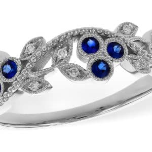 14K White gold triple sapphire clusters with diamond leaves and filigree lady's band bezel set with nine round blue sapphires, 0.23 total carat weight, and round brilliant cut natural diamonds, 0.06 total carat weight, G/H, SI1+.