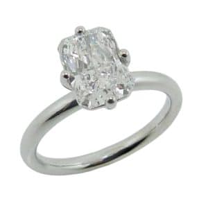 14K White gold compass set solitaire engagement ring with a claw set radiant cut lab grown diamond, 1.59 carat, D, VVS2.
