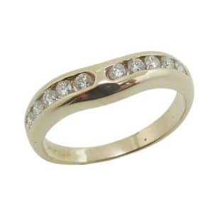 14K Yellow gold curved diamond wedding band channel set with ten natural round brilliant cut diamonds, 0.22 total carat weight, G/H, SI1.
