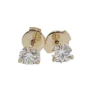 14K Yellow gold three prong studs with locking backs claw set with a 0.548 carat, H, VS2 and a 0.58 carat, I, VS2 ideal round brilliant cut natural diamonds.