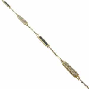 14K Yellow gold 7" bracelet with 3x9 mm onyx bar stations alternating with pave set diamonds bars totaling 0.36 carats.