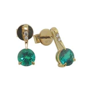14K Yellow gold drop earrings claw set with two 5mm round Chatham emeralds, 0.90 total carat weight, and round brilliant cut lab grown diamonds, 0.03 total carat weight.