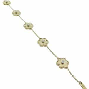 14K Yellow gold 7.5" clover bracelet with five round brilliant cut diamonds bezel set in the center totaling 0.17 carats.