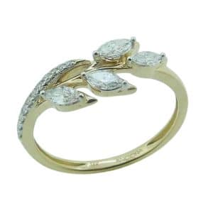 14K Yellow gold lady's asymmetrical fashion ring claw set with eleven round brilliant cut natural diamonds, 0.06cttw; two marquise brilliant cut diamonds, 0.18cttw; and two marquise brilliant cut diamonds, 0.10cttw, all G, SI.