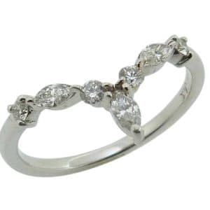 14K White gold chevron style wedding band single prong set with four round brilliant cut natural diamonds, 0.13cttw, and three marquise diamonds, 0.18cttw.