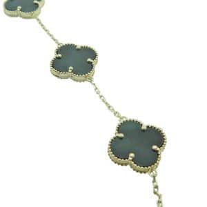 14K Yellow gold 7" onyx five clover bracelet.