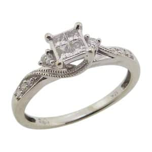Estate item - 10K White gold lady's cluster centre engagement ring set with 0.30 total carat weight princess and round brilliant cut diamonds, I, SI.