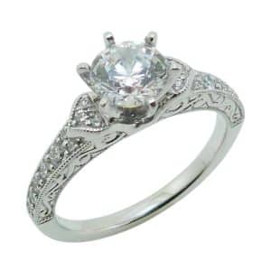 14K White gold six prong engraved solitaire engagement ring claw set in the centre with a 1.0 carat CZ and round brilliant cut diamonds pave set on the band, 0.25cttw.