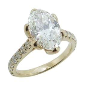 14K Yellow gold 6 prong tulip head engagement ring set with a 2.01 carat D, VS1 oval brilliant cut lab grown diamond, accented with sixteen lab grown, round brilliant cut diamonds, 0.48cttw, E/F, VS+.