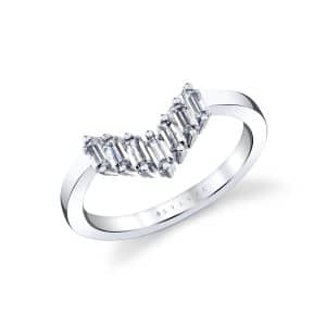 14K White gold diamond curved lady's Sylvie Jewelry band claw set with seven baguette diamonds totaling 0.42 carats.