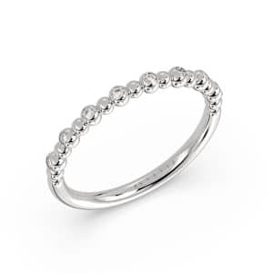 14K White gold diamond beaded band by Sylvie Jewelry bezel set with eight round brilliant cut diamonds totaling 0.10 carats.