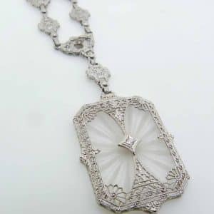 Estate item - 14K White gold 14.5" filigree detailed necklace with carved rock crystal with four round brilliant cut diamonds, 0.07cttw.