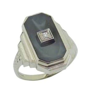 Estate 14K White Art Deco style lady's onyx ring with a 0.01 carat single cut diamond.