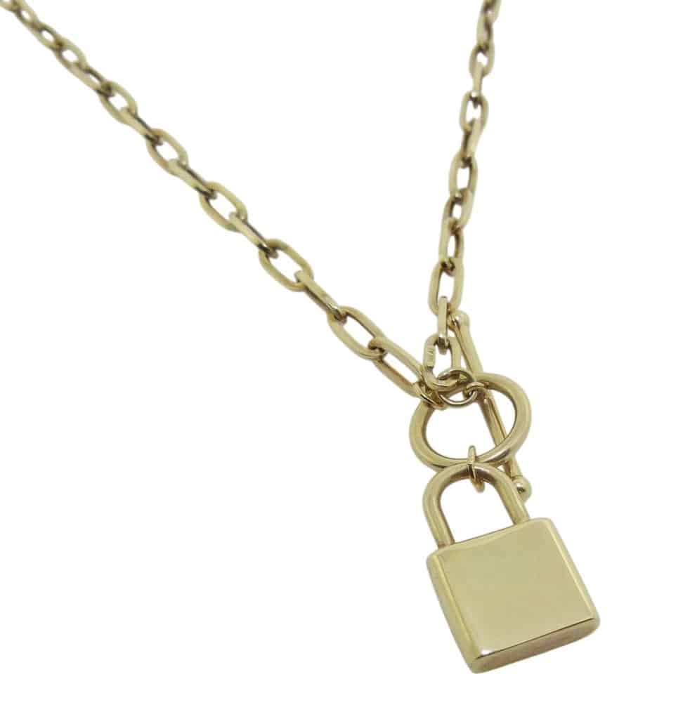 Estate item - 14K Yellow gold 18" oval link necklace with lock pendant.