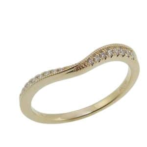 14K Yellow gold chevron band with diagonal milgrain detail claw set with sixteen natural round brilliant cut diamond's, 0.11cttw, G/H, VS-SI.